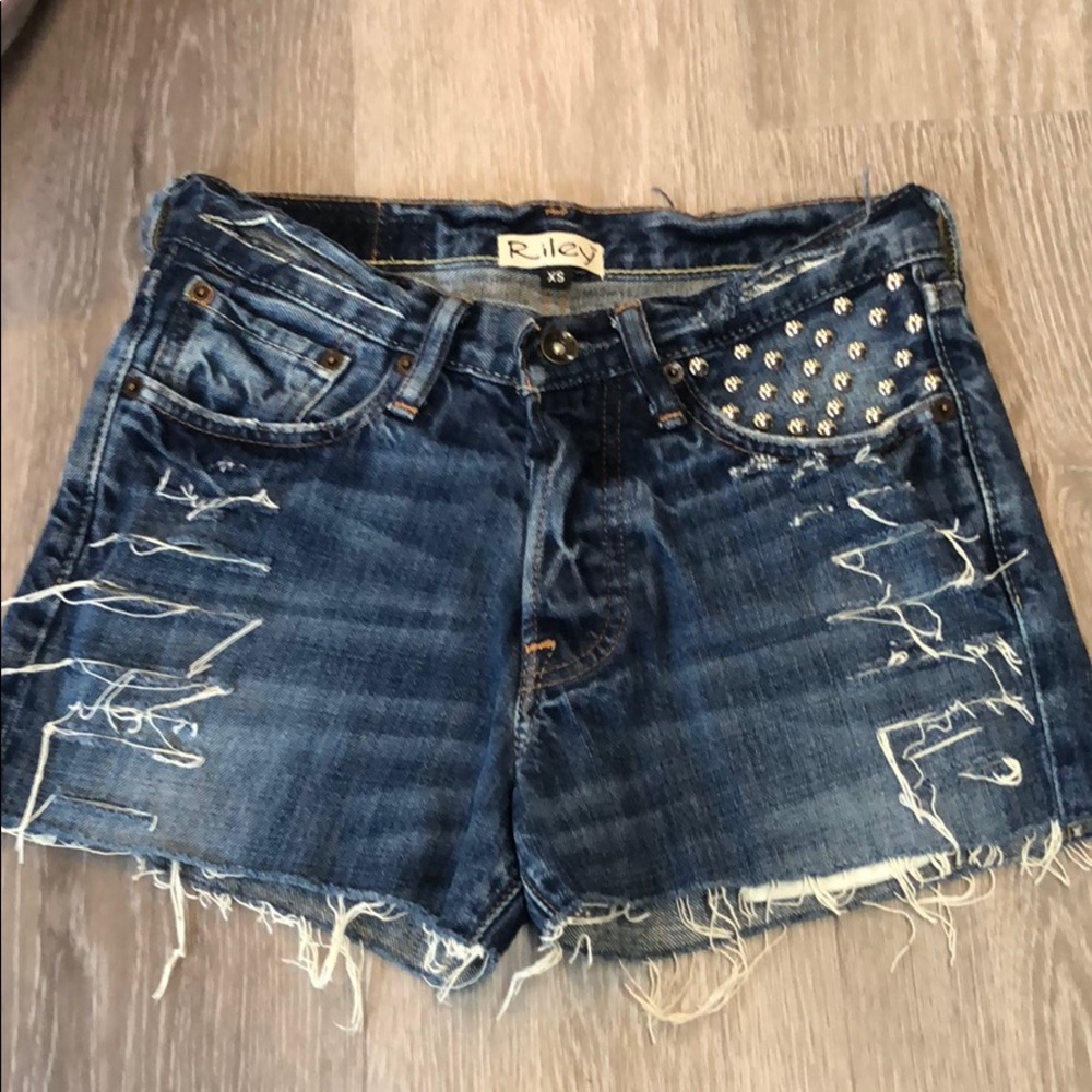 RILEY- VINTAGE LEVIS CUT OFF SHORTS W/ STUDS